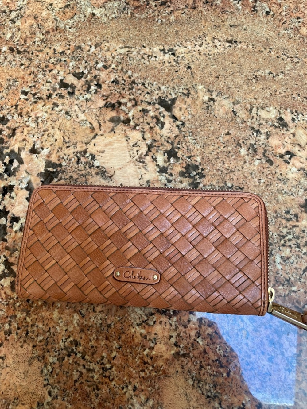 Cole Haan Woven Leather zip around Wallet. Holds credit cards and change